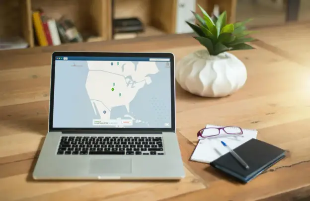 Laptop showing EXIF geolocation data from photo metadata